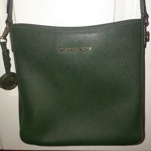 Green crossbody Michael Kors purse